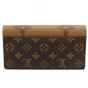 Pre-owned Fabric wallets Louis Vuitton Vintage , Brown , Dames