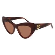 Stijlvolle zonnebril voor modefanaten Gucci , Brown , Unisex