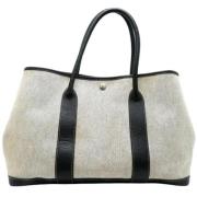 Pre-owned Canvas handbags Hermès Vintage , Beige , Dames