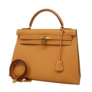 Pre-owned Leather handbags Hermès Vintage , Brown , Dames