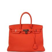 Pre-owned Canvas handbags Hermès Vintage , Red , Dames