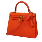 Pre-owned Leather handbags Hermès Vintage , Orange , Dames