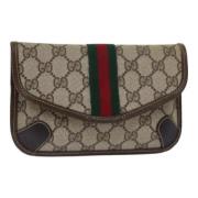 Pre-owned Leather pouches Gucci Vintage , Beige , Dames