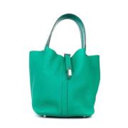 Pre-owned Leather totes Hermès Vintage , Green , Dames