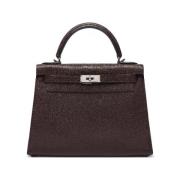 Pre-owned Leather handbags Hermès Vintage , Brown , Dames