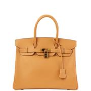 Pre-owned Canvas handbags Hermès Vintage , Yellow , Dames