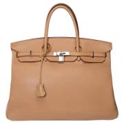 Pre-owned Leather handbags Hermès Vintage , Brown , Dames