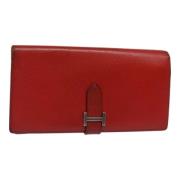 Pre-owned Leather clutches Hermès Vintage , Red , Dames