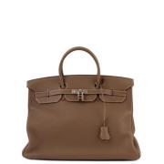 Pre-owned Canvas handbags Hermès Vintage , Brown , Dames