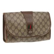 Pre-owned Leather clutches Gucci Vintage , Beige , Dames