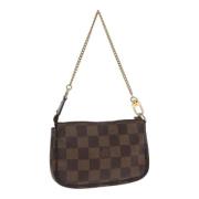 Pre-owned Canvas clutches Louis Vuitton Vintage , Brown , Dames