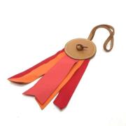 Pre-owned Leather key-holders Hermès Vintage , Orange , Unisex