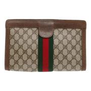 Pre-owned Leather clutches Gucci Vintage , Beige , Dames