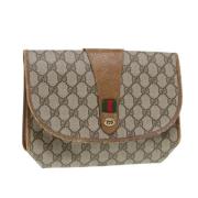 Pre-owned Leather clutches Gucci Vintage , Beige , Dames