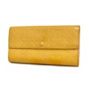 Pre-owned Fabric wallets Louis Vuitton Vintage , Yellow , Dames