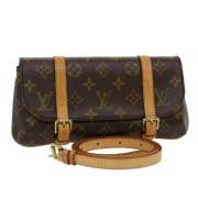 Pre-owned Canvas pouches Louis Vuitton Vintage , Brown , Dames