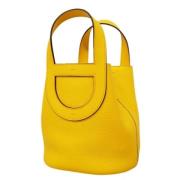 Pre-owned Leather handbags Hermès Vintage , Yellow , Dames