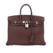 Pre-owned Leather handbags Hermès Vintage , Brown , Dames