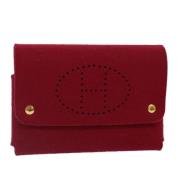 Pre-owned Canvas pouches Hermès Vintage , Red , Dames