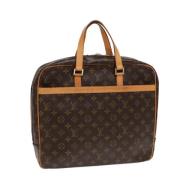 Pre-owned Canvas handbags Louis Vuitton Vintage , Brown , Unisex