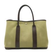 Pre-owned Canvas totes Hermès Vintage , Green , Dames