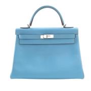 Pre-owned Leather handbags Hermès Vintage , Blue , Dames