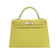 Pre-owned Leather handbags Hermès Vintage , Green , Dames