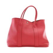 Pre-owned Leather handbags Hermès Vintage , Pink , Dames