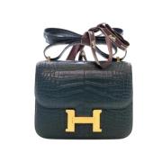 Pre-owned Leather handbags Hermès Vintage , Green , Dames