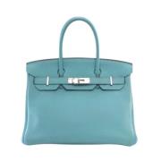 Pre-owned Leather handbags Hermès Vintage , Blue , Dames