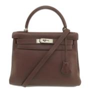 Pre-owned Leather handbags Hermès Vintage , Brown , Dames