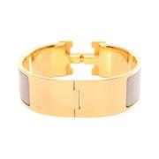 Pre-owned Metal bracelets Hermès Vintage , Yellow , Dames