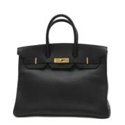 Pre-owned Leather handbags Hermès Vintage , Black , Dames