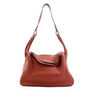 Pre-owned Leather handbags Hermès Vintage , Red , Dames