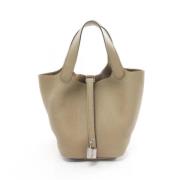 Pre-owned Leather handbags Hermès Vintage , Beige , Dames