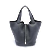 Pre-owned Leather handbags Hermès Vintage , Black , Dames