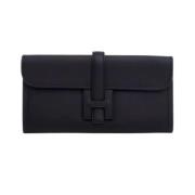 Pre-owned Leather clutches Hermès Vintage , Black , Dames