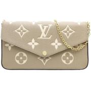 Pre-owned Fabric wallets Louis Vuitton Vintage , Beige , Dames