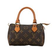 Pre-owned Canvas handbags Louis Vuitton Vintage , Brown , Dames