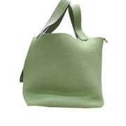 Pre-owned Leather handbags Hermès Vintage , Green , Dames