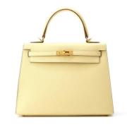 Pre-owned Leather handbags Hermès Vintage , Beige , Dames