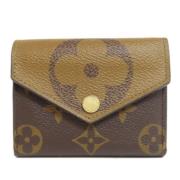 Pre-owned Fabric wallets Louis Vuitton Vintage , Brown , Dames