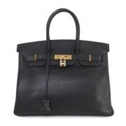 Pre-owned Leather handbags Hermès Vintage , Black , Dames