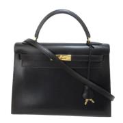 Pre-owned Leather handbags Hermès Vintage , Black , Heren