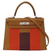 Pre-owned Leather handbags Hermès Vintage , Brown , Dames