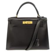 Pre-owned Leather handbags Hermès Vintage , Black , Dames