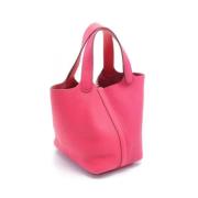 Pre-owned Leather handbags Hermès Vintage , Pink , Dames