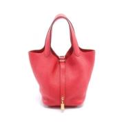 Pre-owned Leather handbags Hermès Vintage , Red , Dames