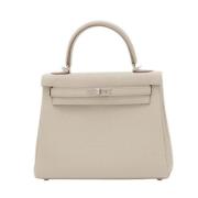 Pre-owned Leather handbags Hermès Vintage , Beige , Dames