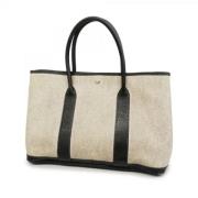 Pre-owned Fabric handbags Hermès Vintage , Beige , Dames